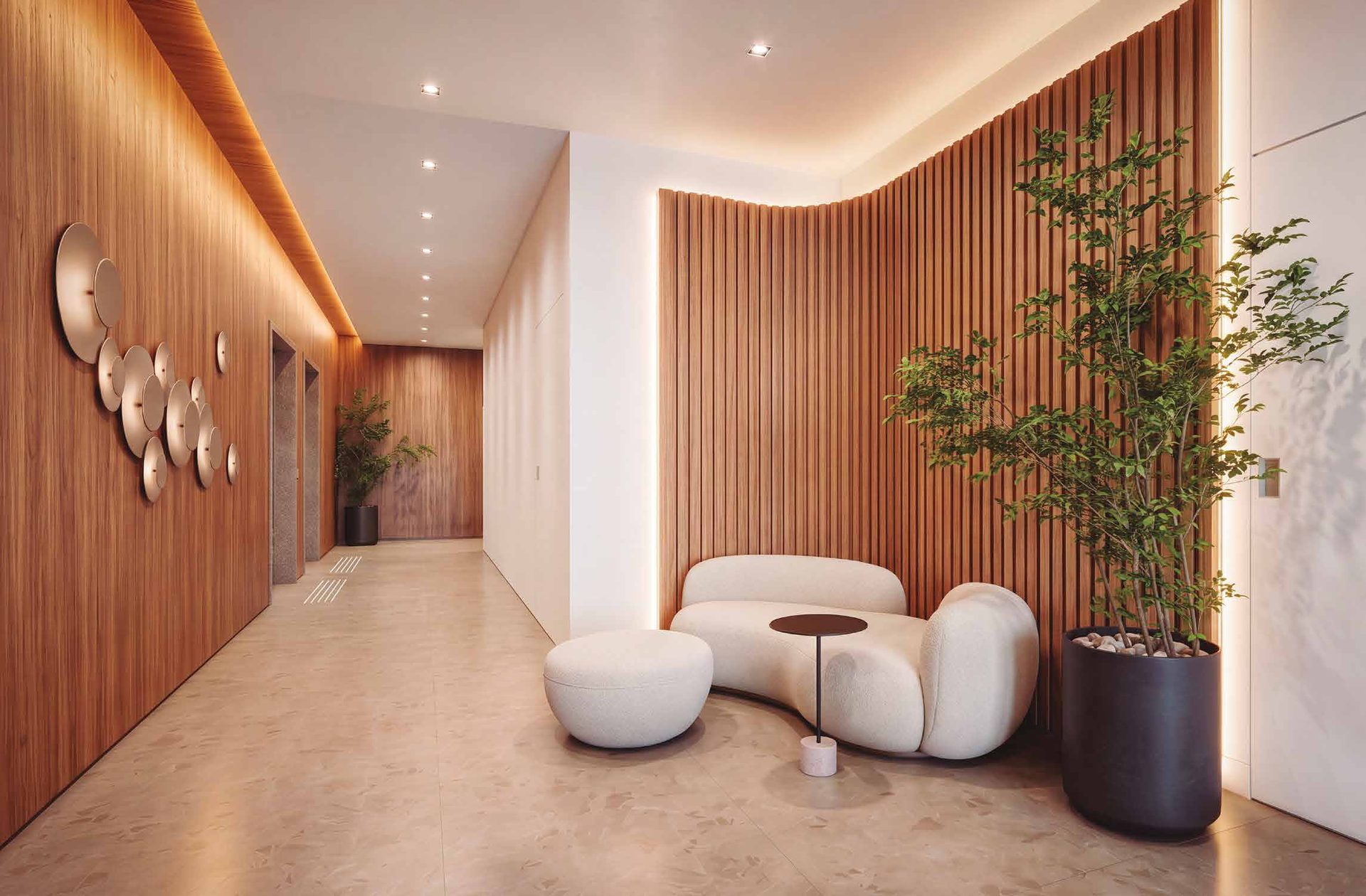 Lobby do Elysium com marcenaria ripada, poltronas e paisagismo interno