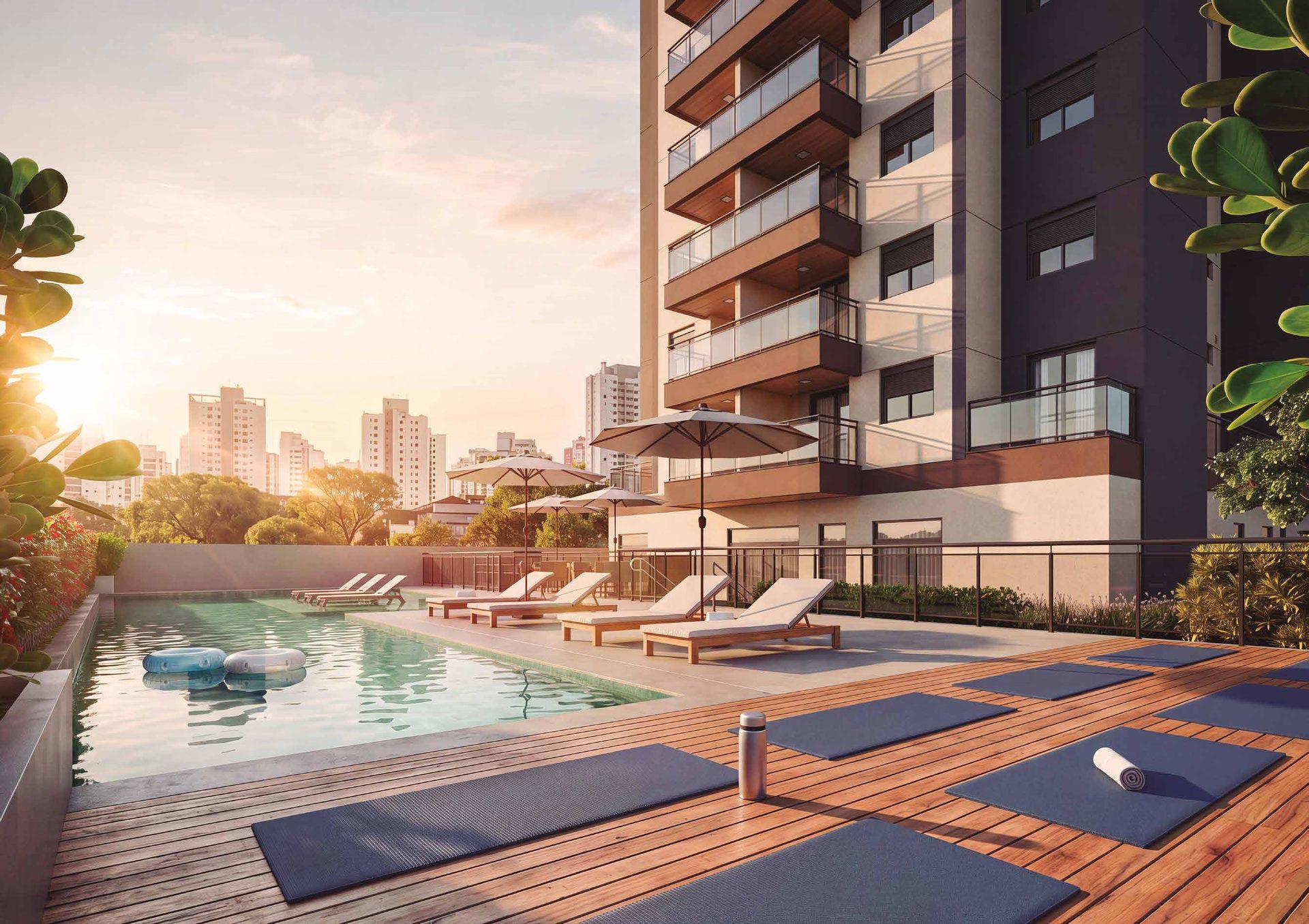 Piscina do Elysium com deck molhado, espreguiçadeiras e deck de yoga