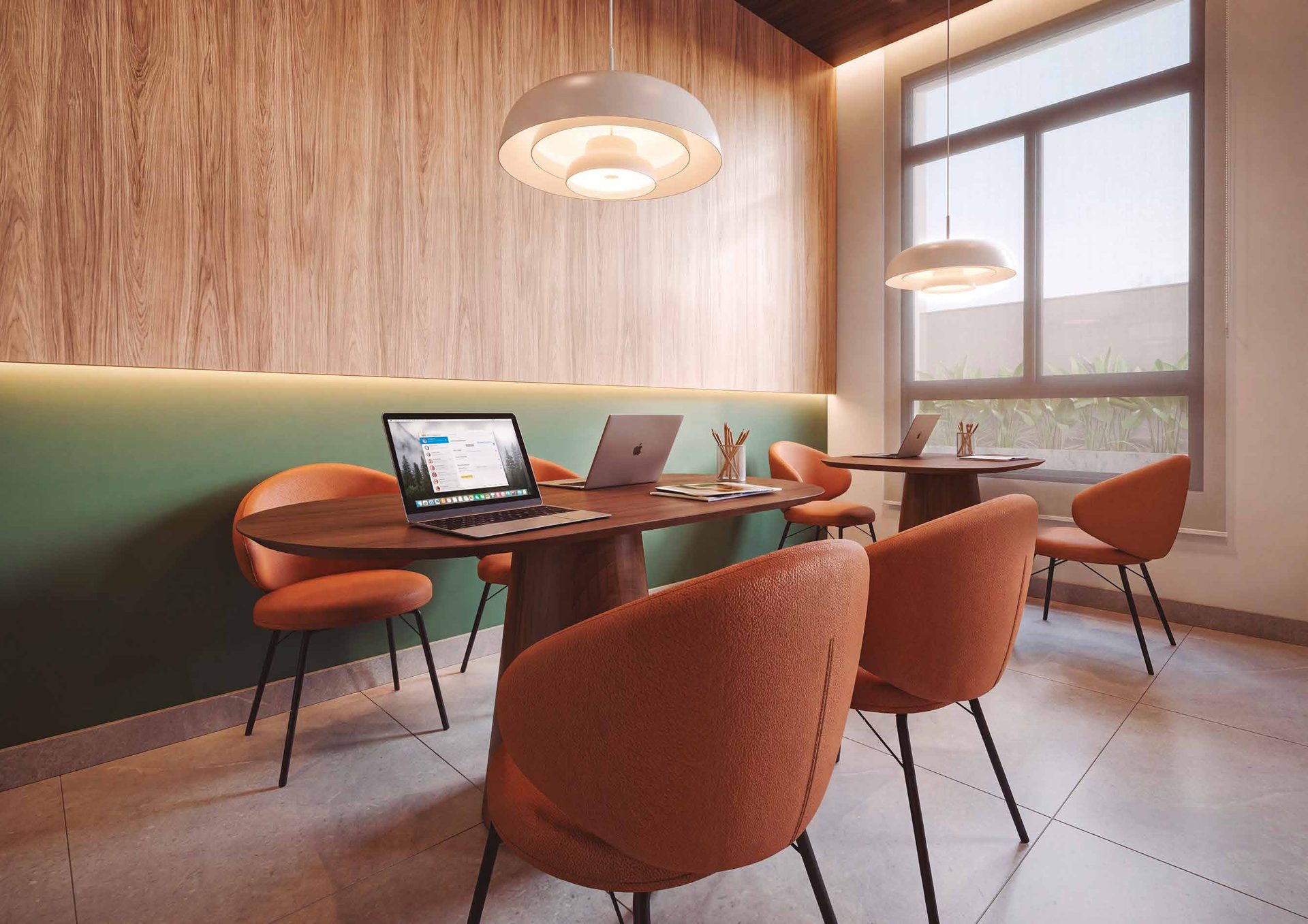 Coworking do Elysium, com mesas compartilhadas e iluminação natural